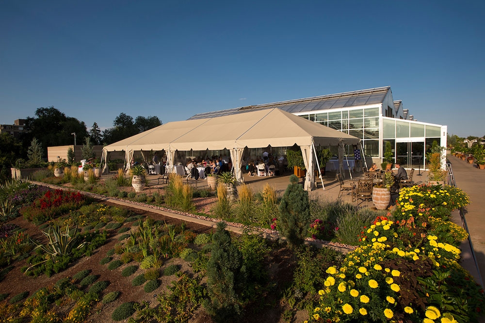 A canopy set up over the west terrace during sunset
