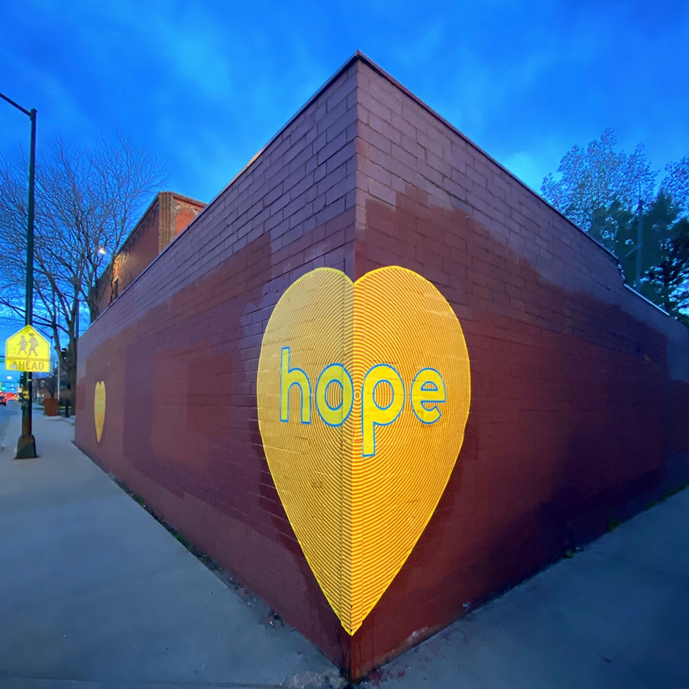 Koko Bayer, Hope (installation on 6th Avenue, Denver), paper and wheat paste, 2020
