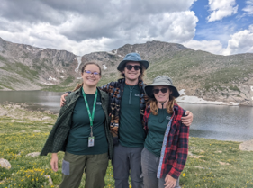 Three interns at lake
