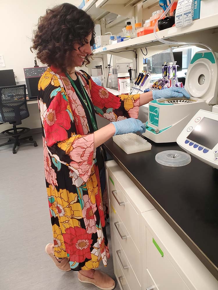 researcher in genetics lab