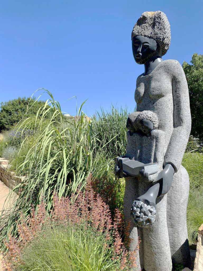“So Proud of My Children” by Nicholas Kadzungura in the Ornamental Grasses Garden