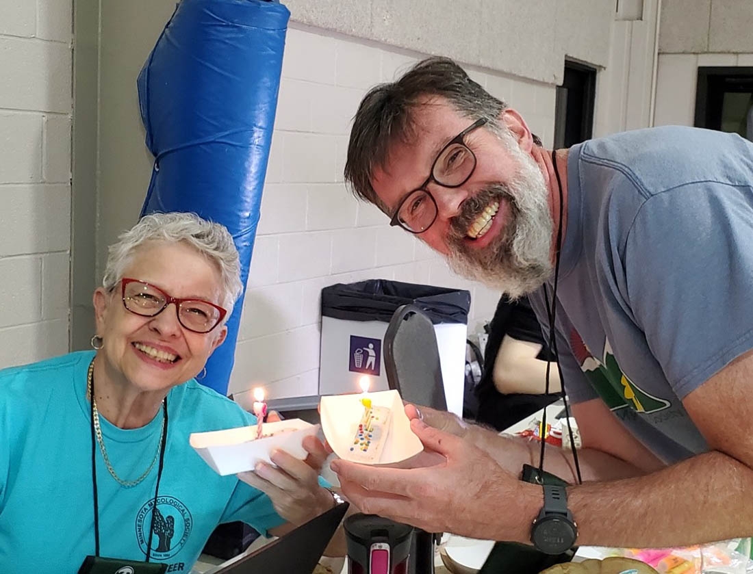 Andy and Adele with birthday snack cakes