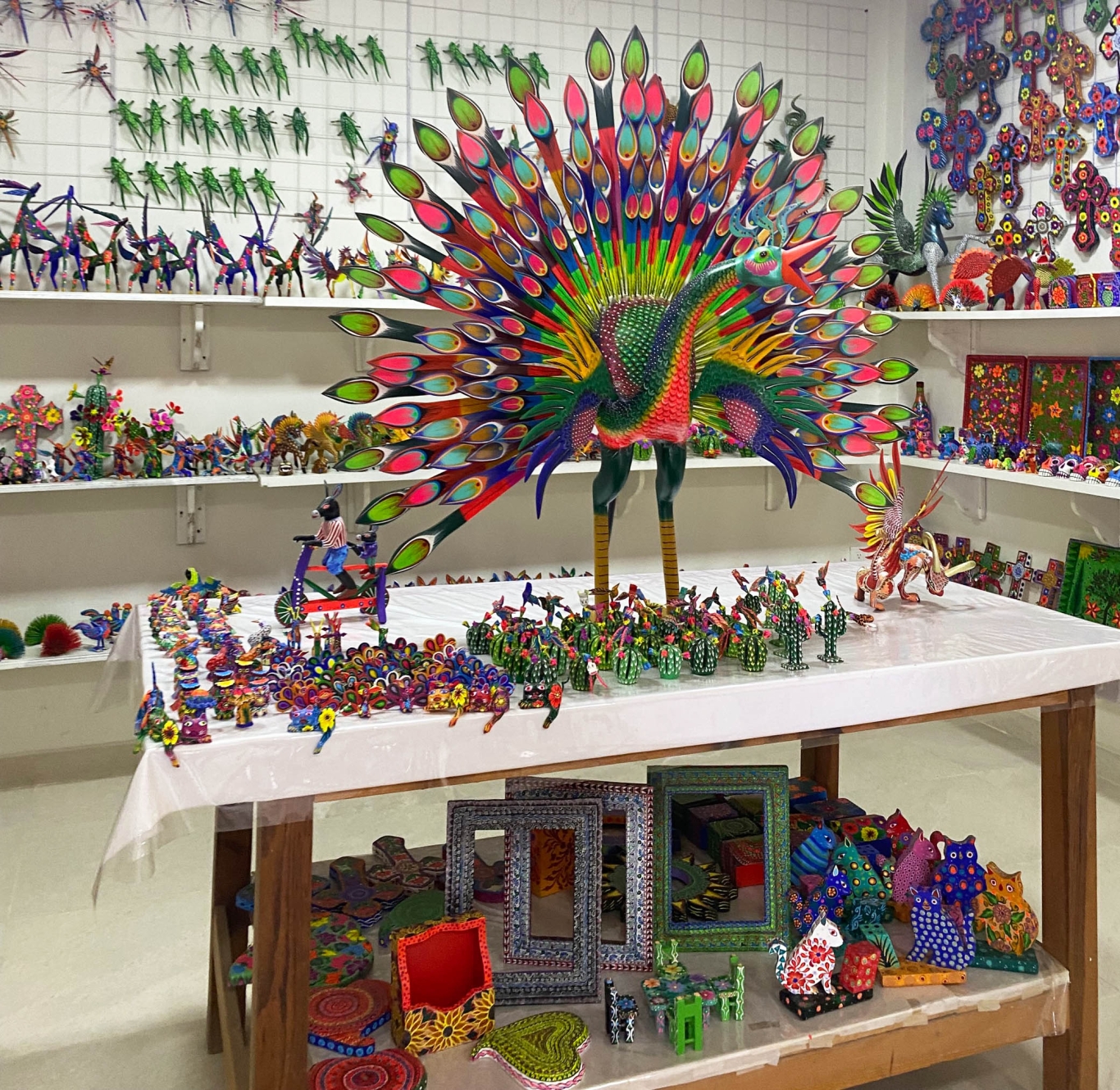Alebrije shop with a huge, colorful peacock 
