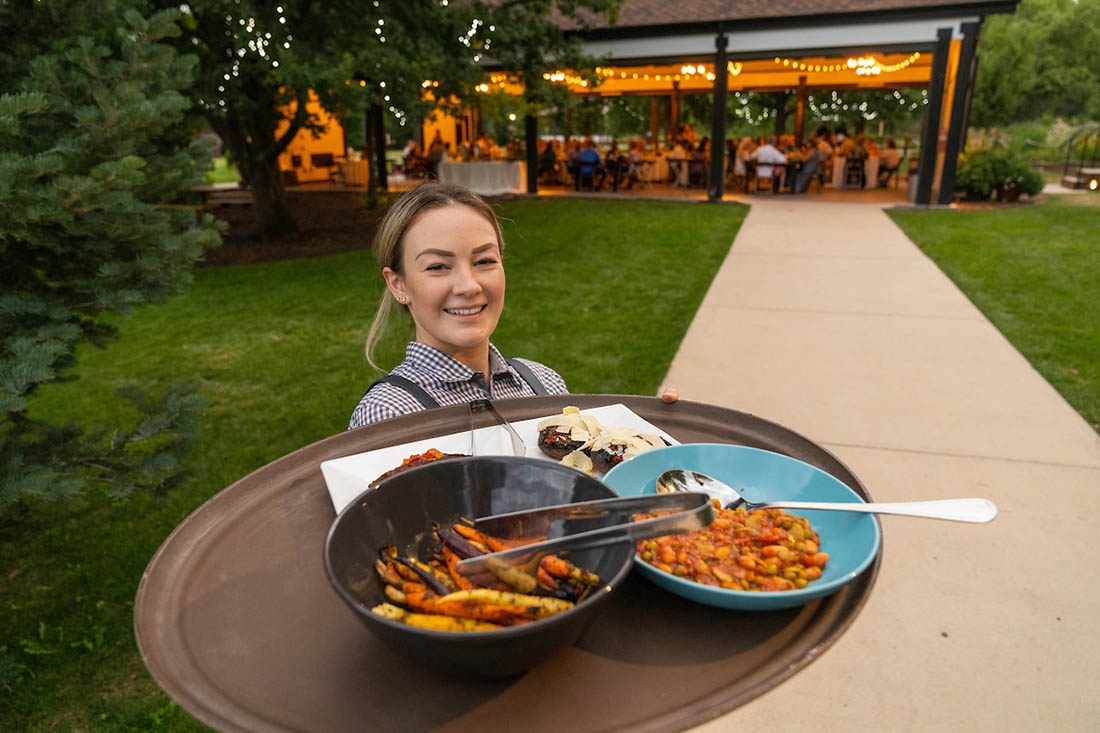 Caterer with tray of food