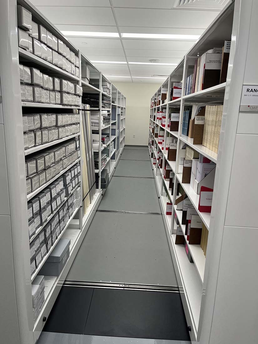 Rows of shelves holding artworks